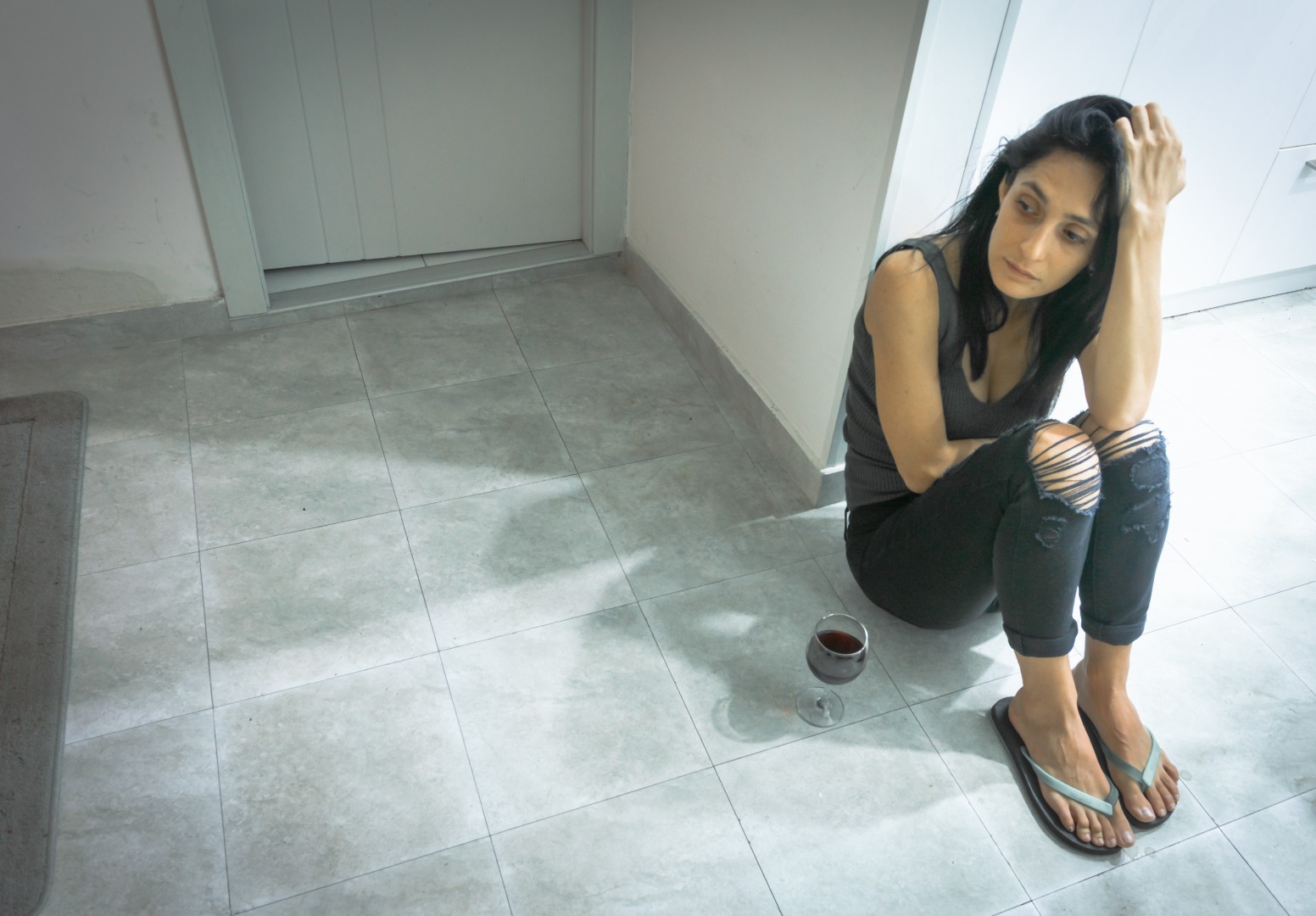 vecteezy-young-sad-housewife-in-the-kitchen-2786207